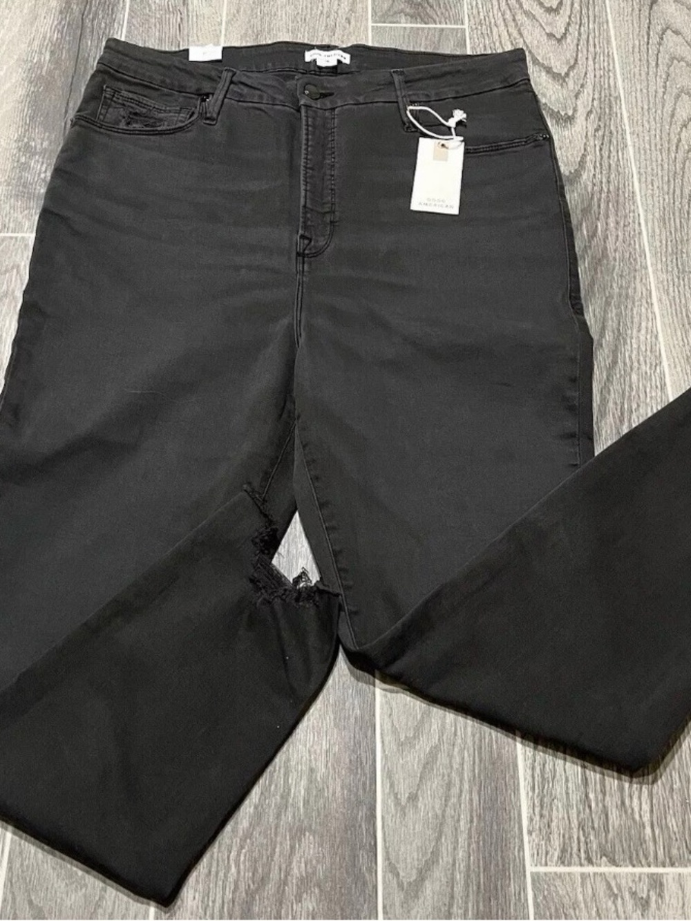 Good American Straight-Leg Black Jeans with Subtle Distressing